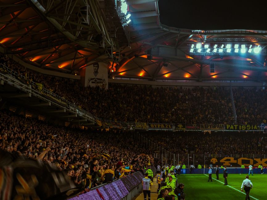 football stadium night match fans
